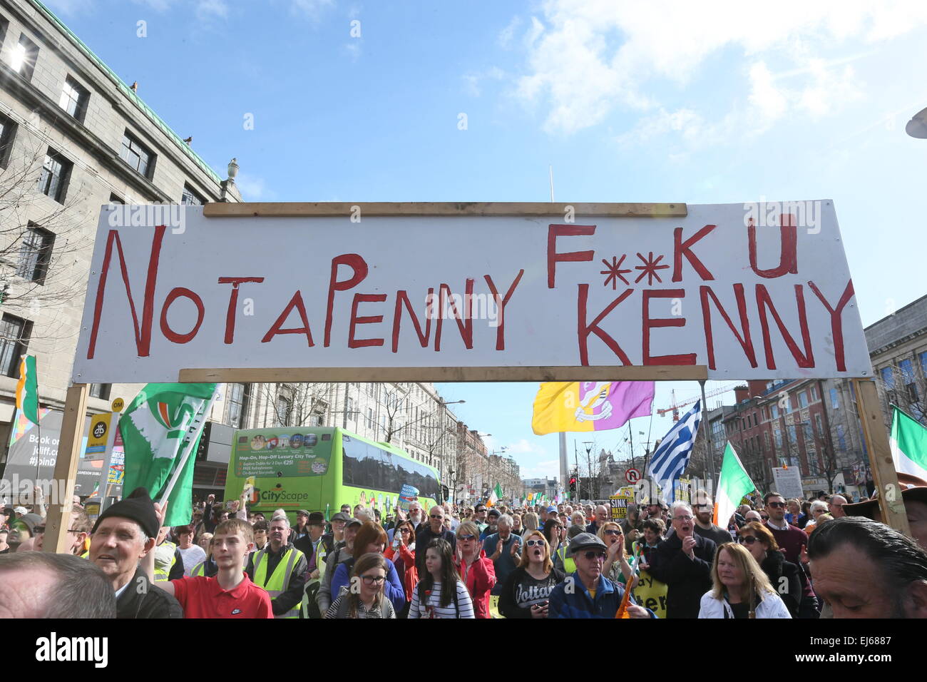 A sign criticising Taoiseach Enda Kenny. Image from the anti-water charges Right2Water protest in Dublin city centre. Stock Photo