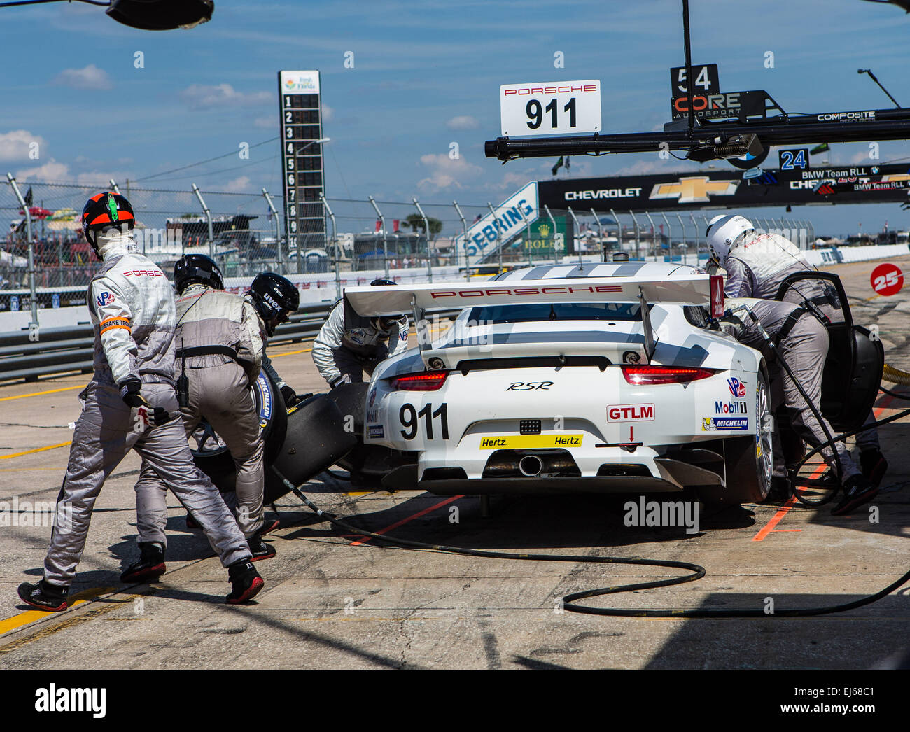 3/21/2015 - Sebring FL, USA - Pit crew in action for Porsche North America with drivers Nick Tandy-Bedford, United Kingdom/Patrick Pilet-Auch, France/Richard Lietz-Ybbs, Austria in a Porsche 911 RSR car with a Porsche engine and Michelin Tires sponsored by Porsche North America at the Sebring International Raceway in Sebring FL. DelMecum/Cal Sport Media Stock Photo