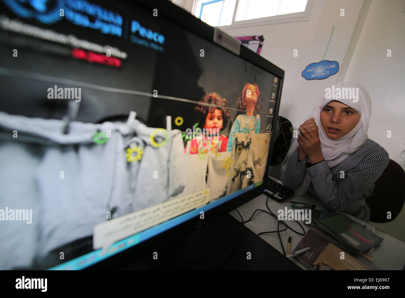 Gaza. 22nd Mar, 2015. A Palestinian student attends a lesson in a computer laboratory at a UN-run school which is reopened after it was damaged during the war between Israel and Hamas militants in Khuzaa village of the southern Gaza Strip city of Khan Yunis, on March 22, 2015. © Khaled Omar/Xinhua/Alamy Live News Stock Photo