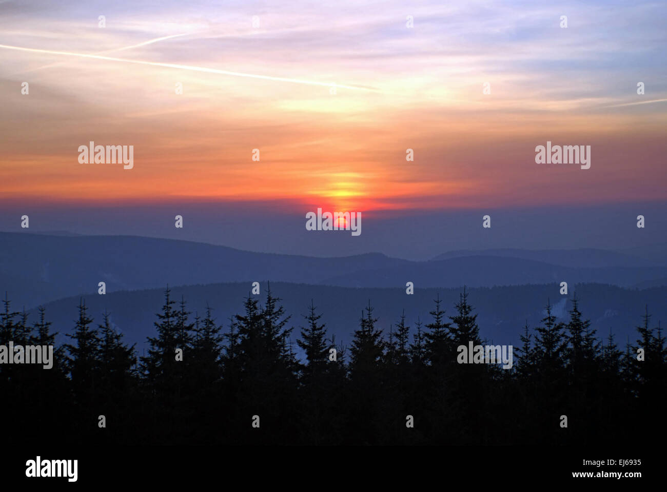 colourful sunrise on winter mountains near Travny hill Stock Photo