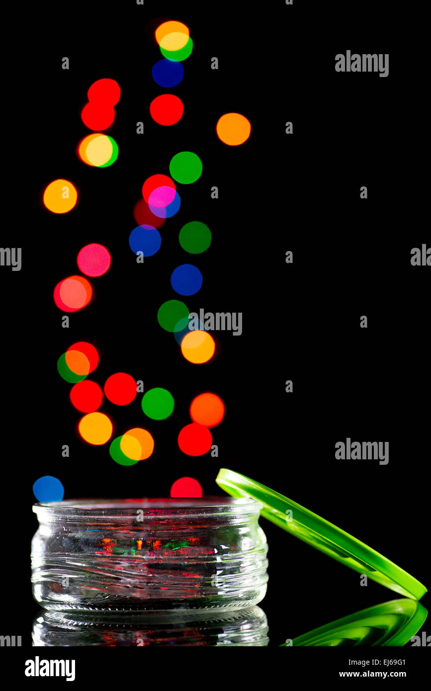 Jar in black background and colorful bokeh Stock Photo
