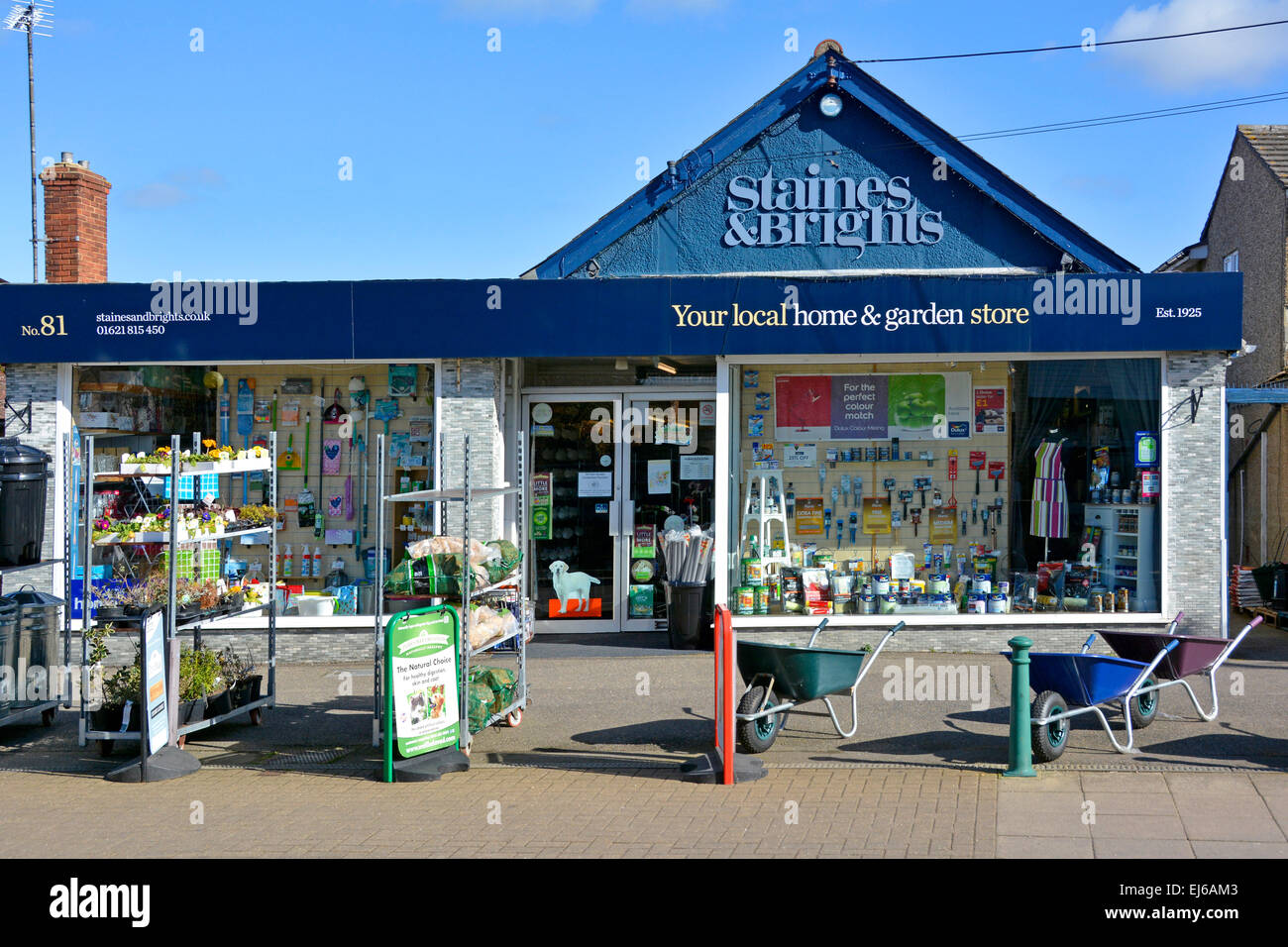 Local home and garden store shop front window and pavement display Tiptree village Essex England UK Stock Photo