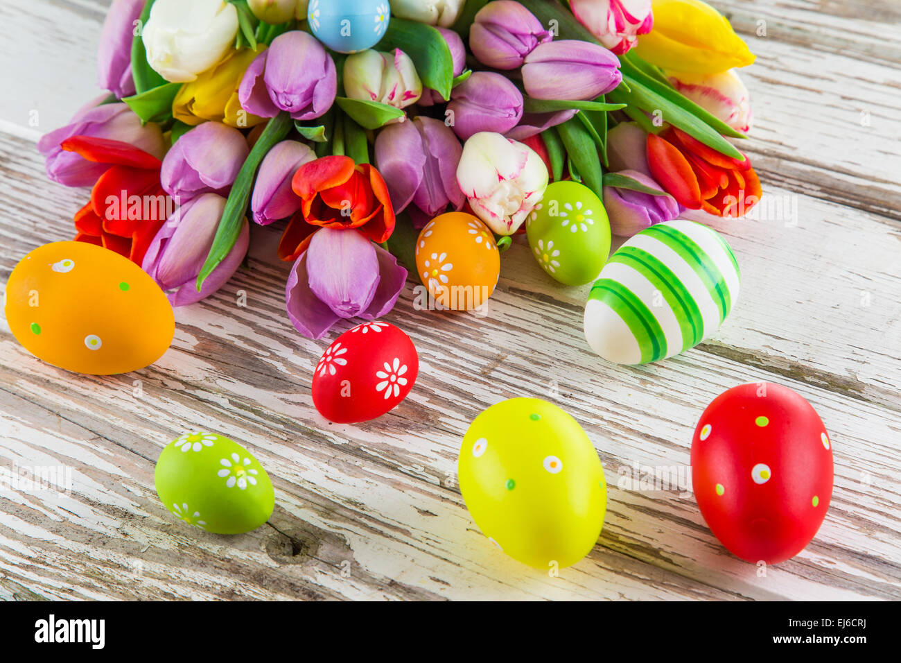 Beautiful bouquet of tulips with easter eggs, close-up Stock Photo - Alamy