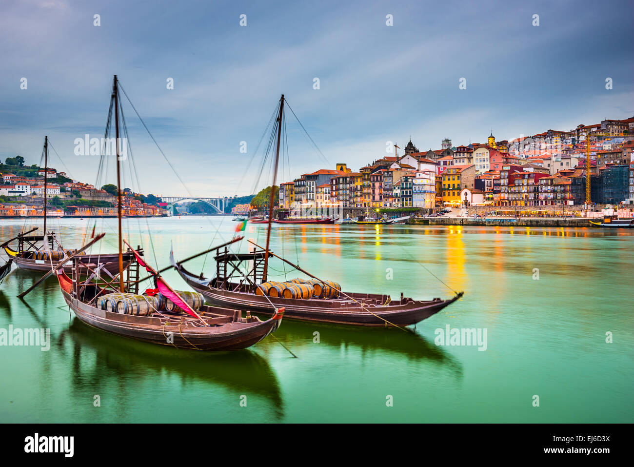 Porto, Portugal old town cityscape on the Douro River with traditional Rabelo boats. Stock Photo