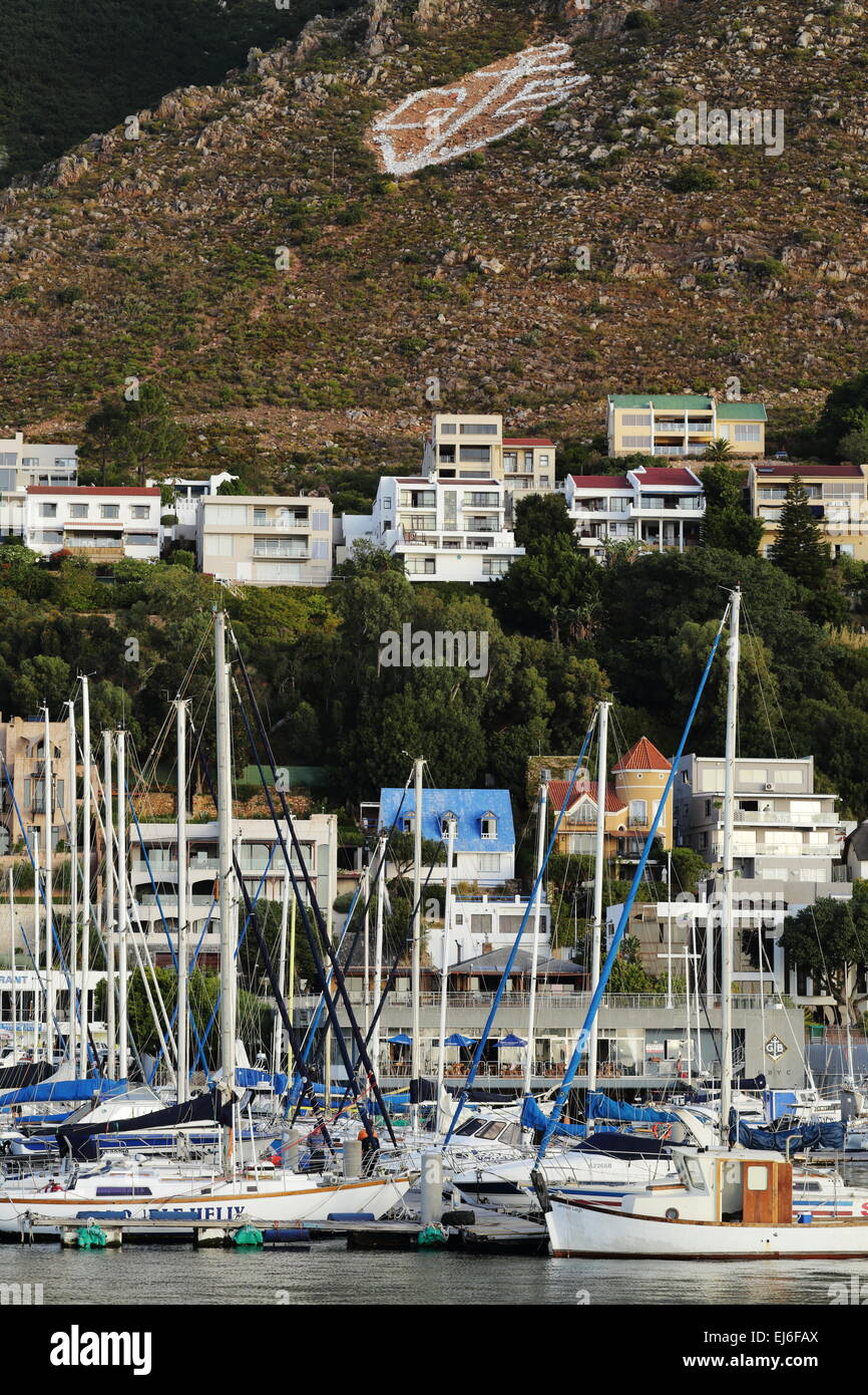 Yachts moored in Gordon's Bay harbour on the False Bay coast Stock Photo