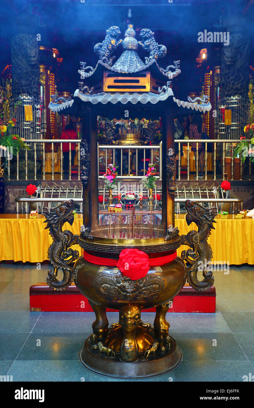 Incense burning at Anping Matsu Temple, dedicated to Matsu, Goddess of the Sea, Tainan, Taiwan Stock Photo