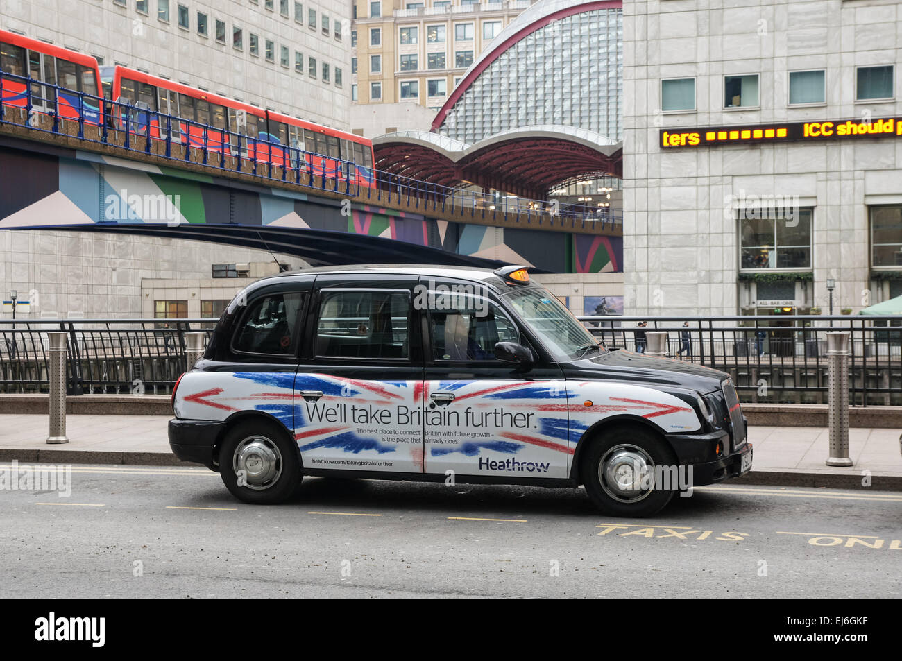 A taxi rank outside Canary Wharf station, London England United Kingdom UK Stock Photo