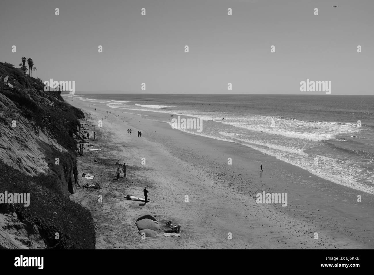Grandview beach access in Encinitas, CA, people sunbathing and walking