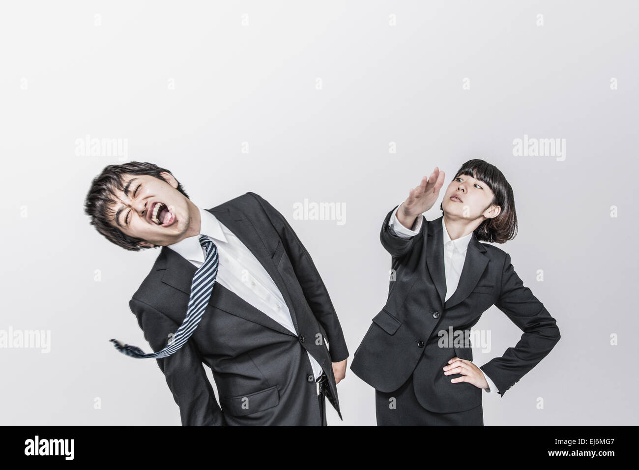 Japanese business people fighting extremely Stock Photo