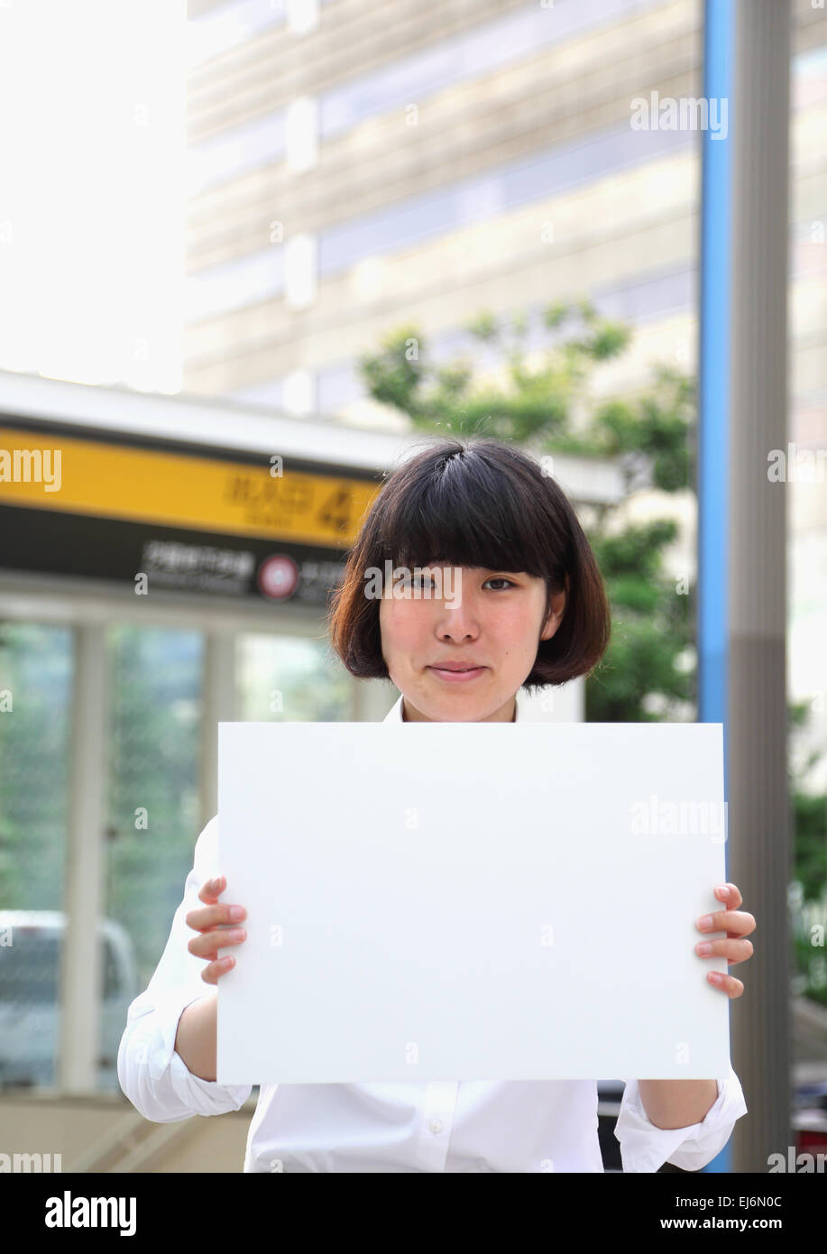 Japanese business woman with white board Stock Photo