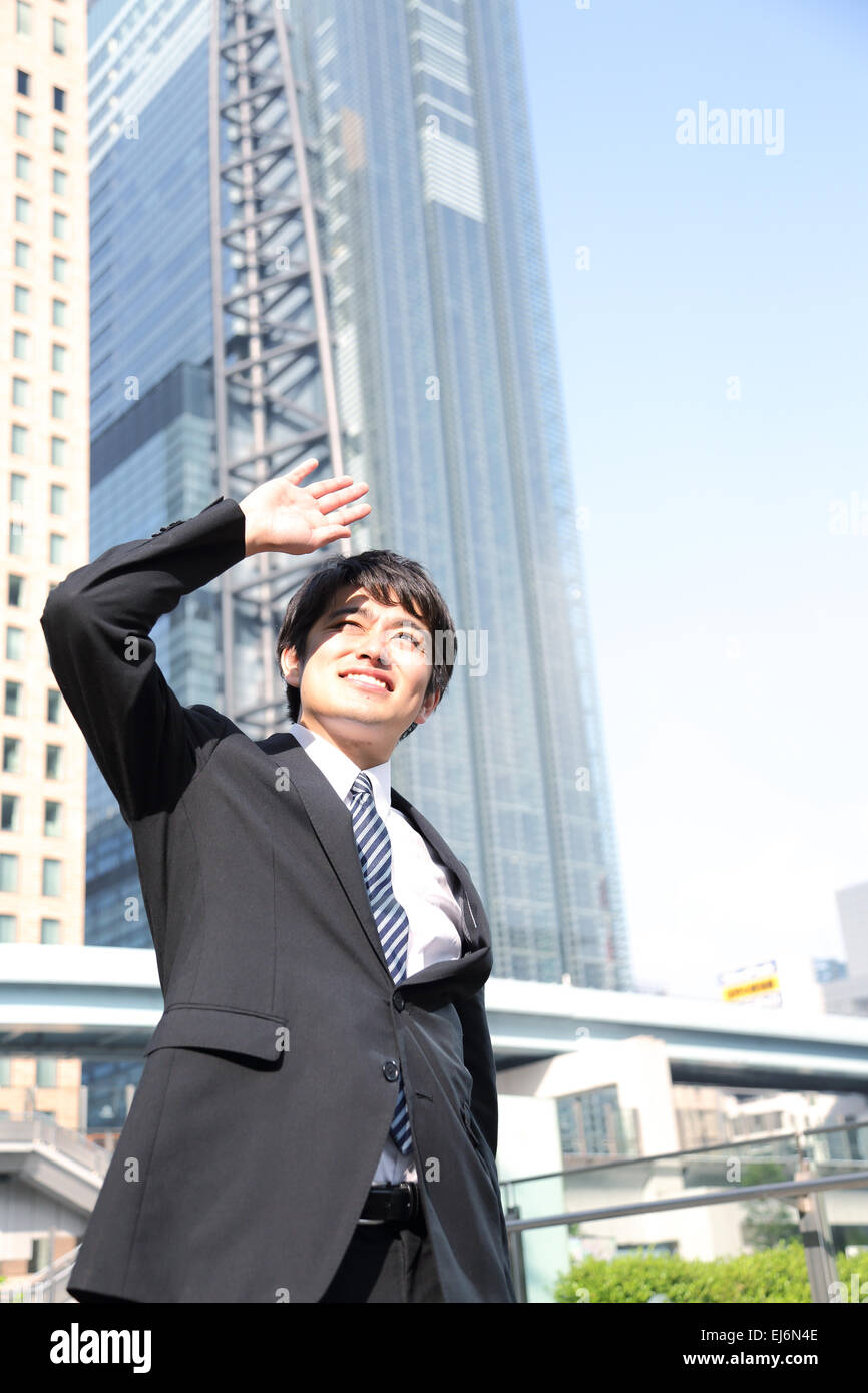 Japanese businessman tired during the hot Japanese Summer Stock Photo