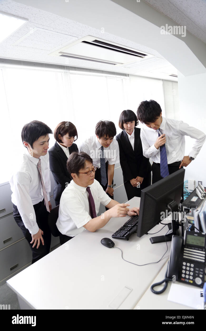 Japanese business people working in the office Stock Photo