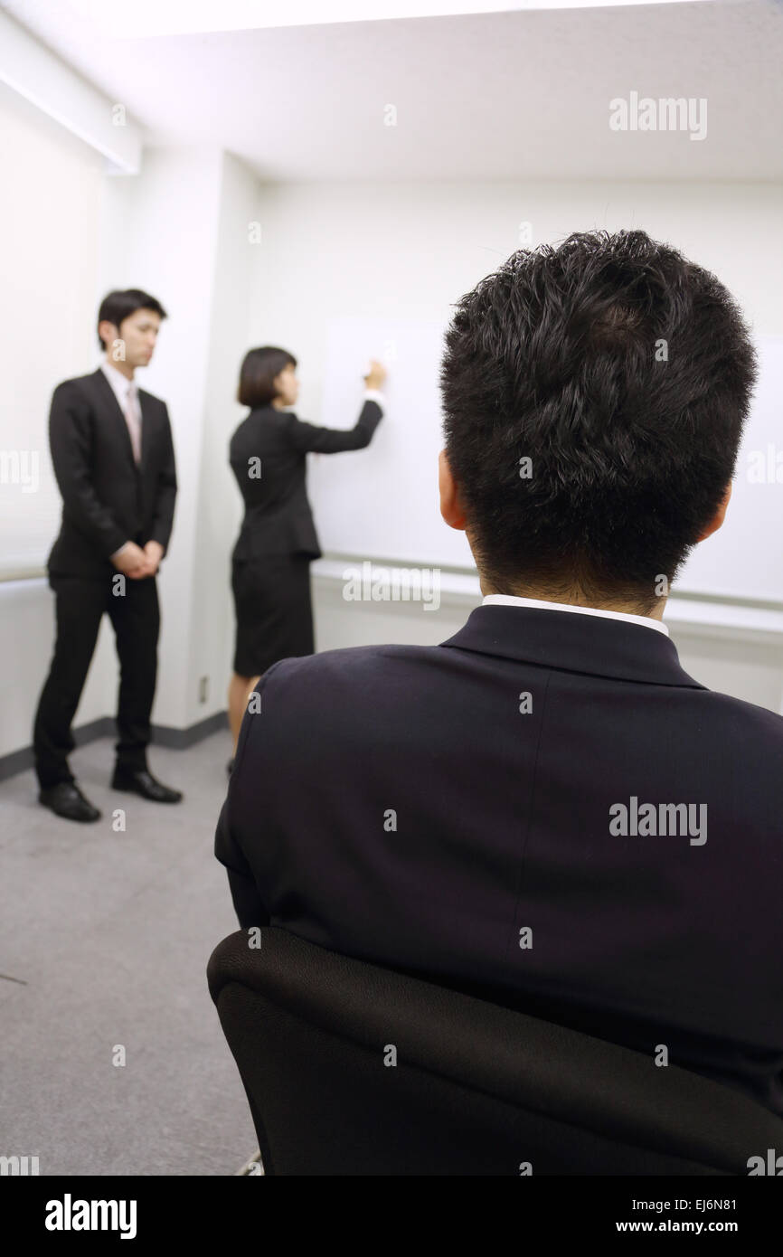 Young Japanese business people work examination Stock Photo