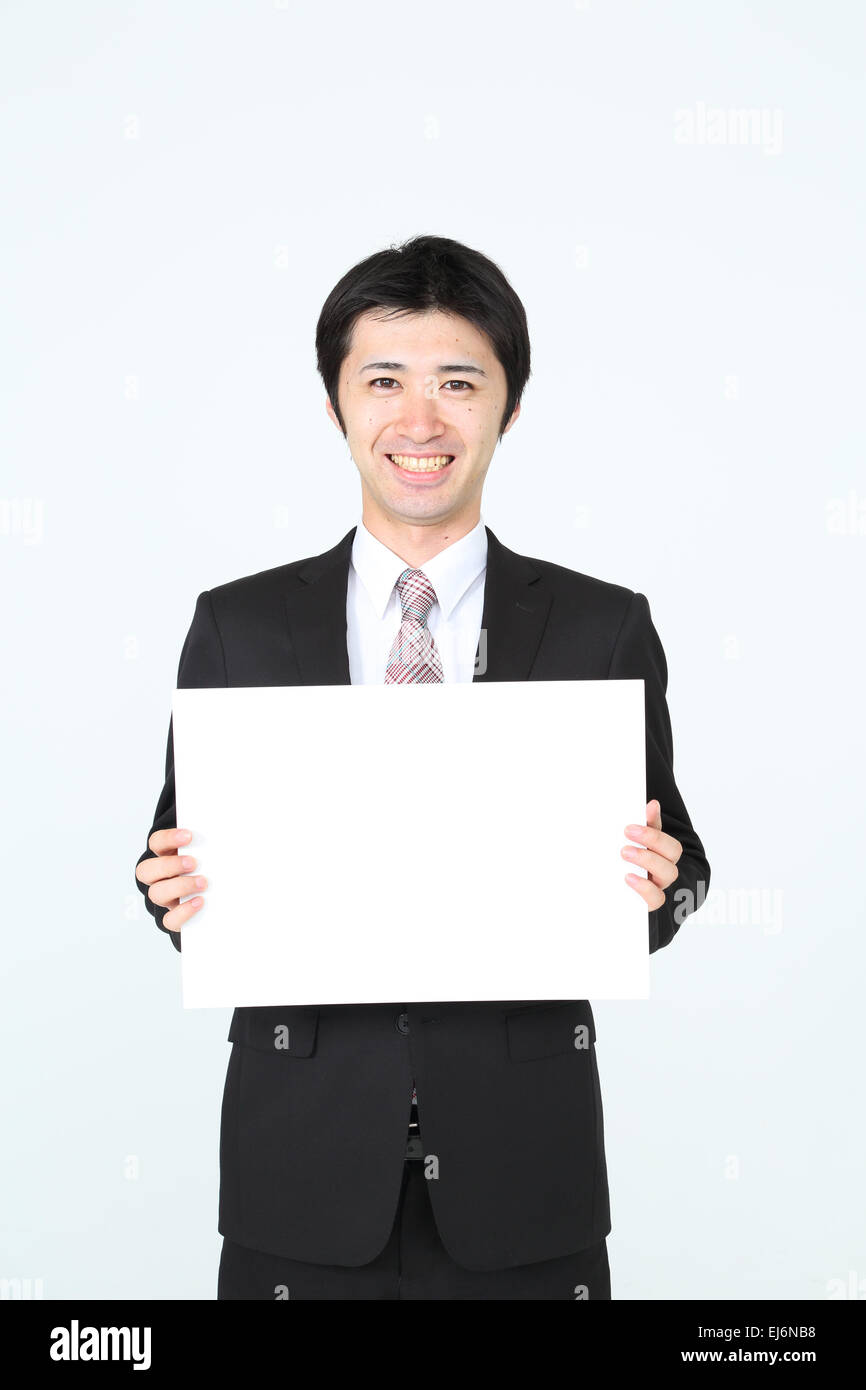 Japanese businessman with white board Stock Photo