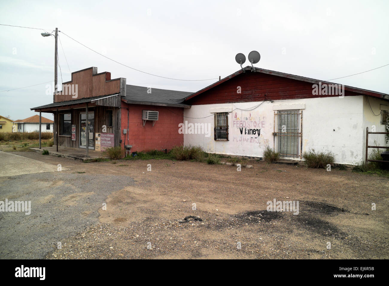Abandoned convenience store and feed store next to U.S. Highway 83 in a rural area of south Texas, USA. Stock Photo