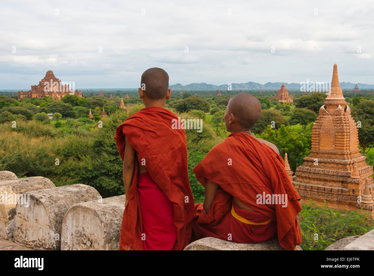 Monks with ancient temples and pagodas, Bagan, Mandalay Region, Myanmar Stock Photo