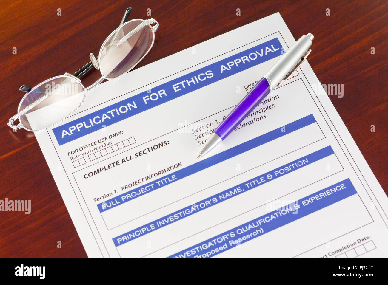 Application for Ethics Approval Form on Desk Stock Photo