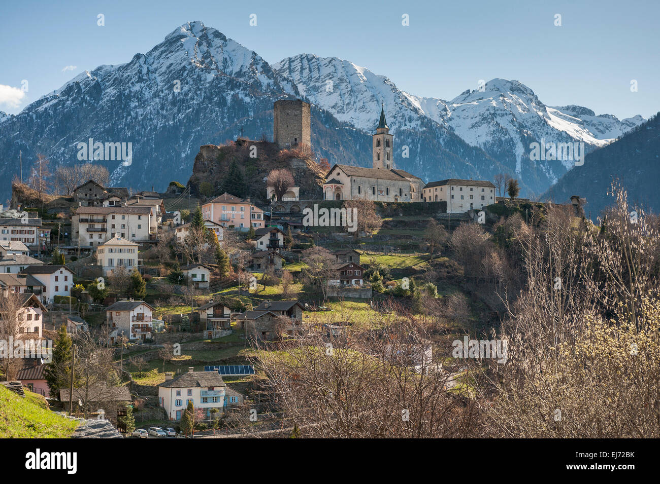 Mountain village of Santa Maria di Calanca, pilgrimage church and medieval tower, Alps, Calanca Mountain Trail Stock Photo