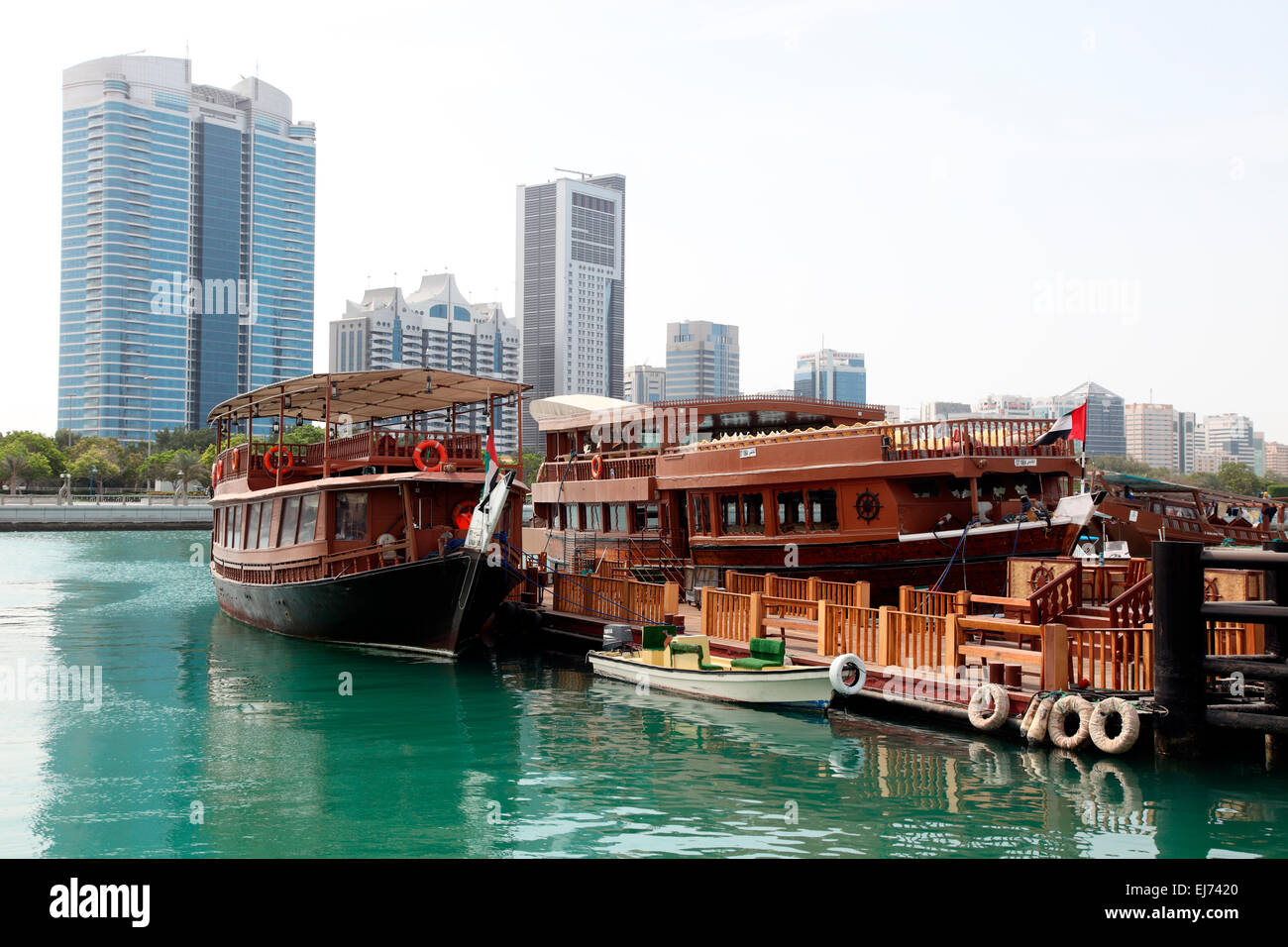 Abu Dhabi dinner cruise vessels Dhow Harbour. Stock Photo