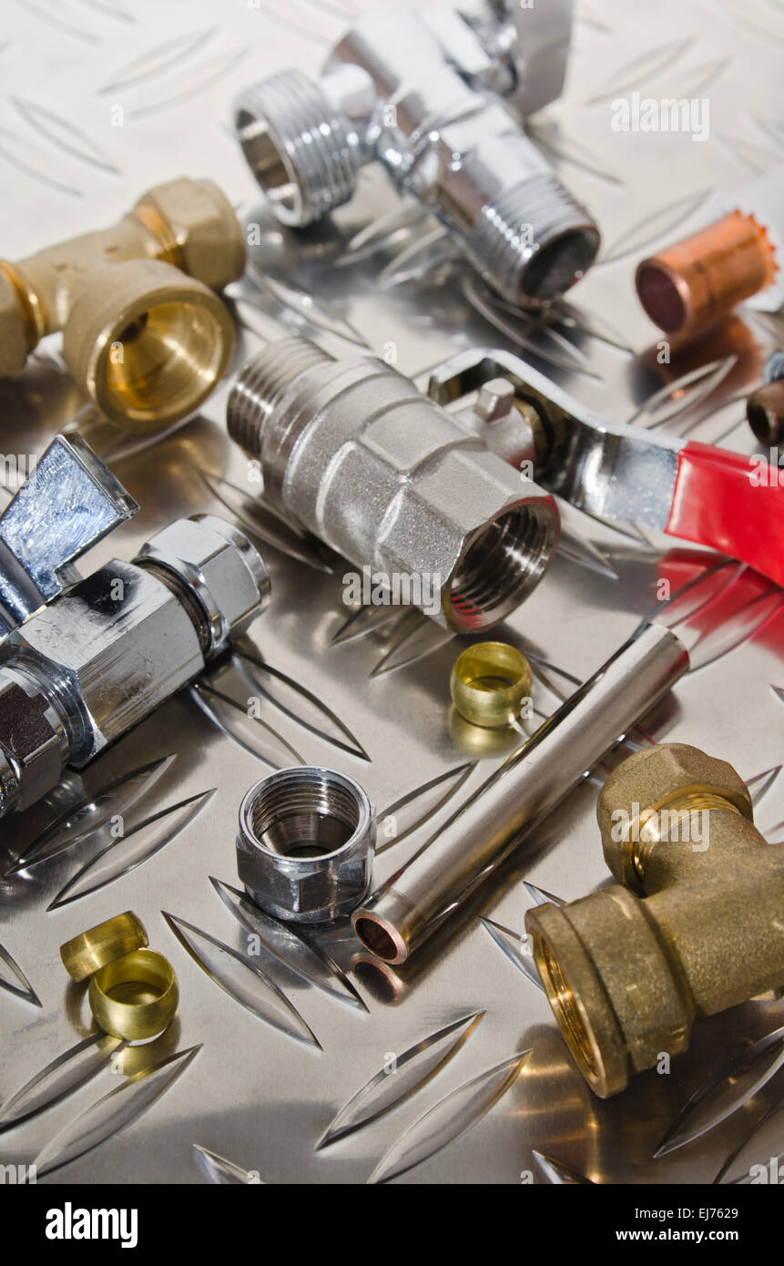 Plumbing Kit on a metal surface Stock Photo Alamy
