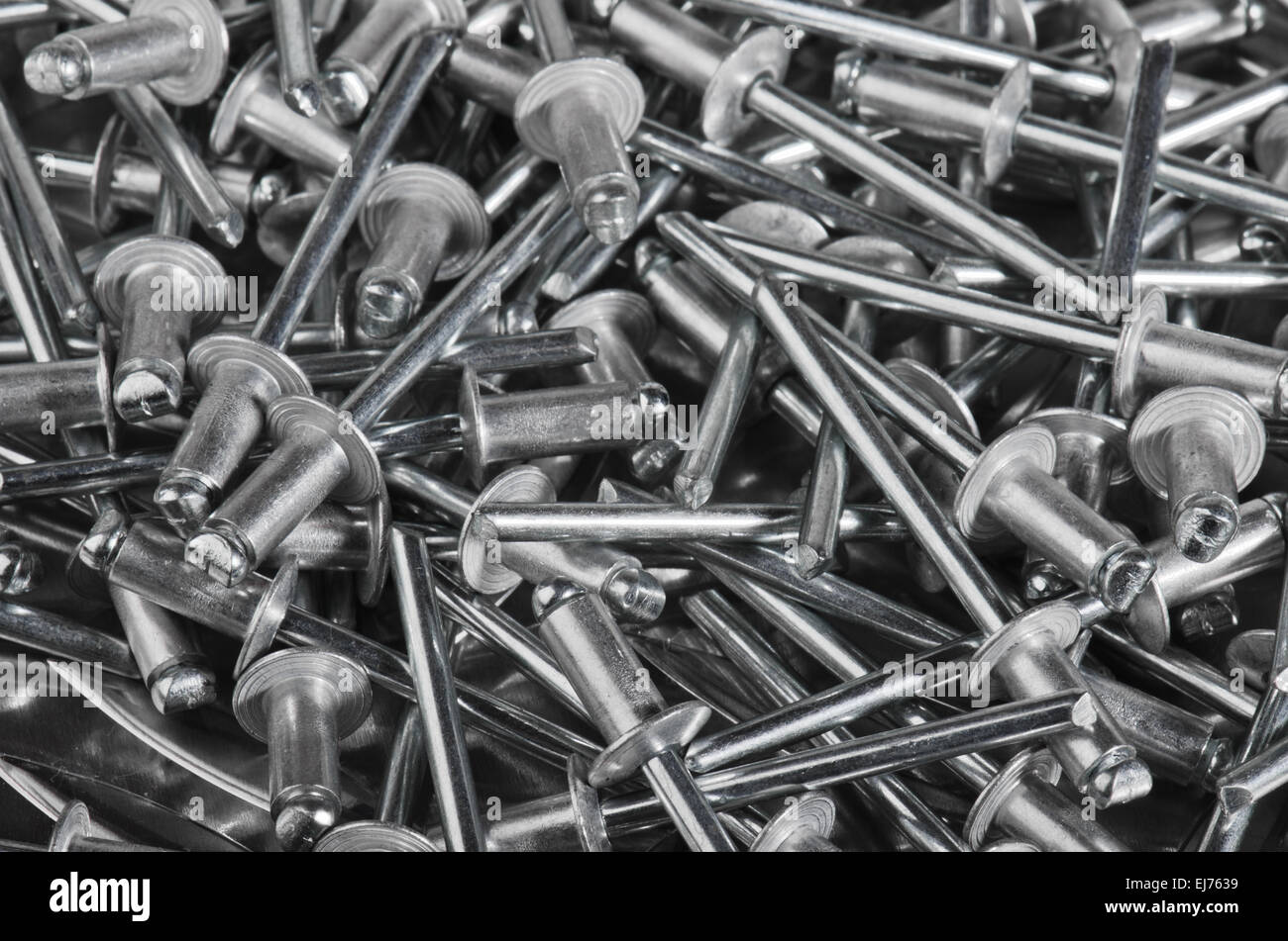 Aluminium assembly rivets, close up Stock Photo - Alamy