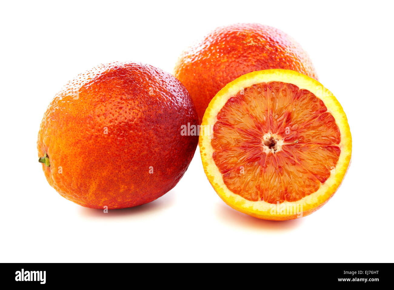 Full and half of blood red oranges. Stock Photo