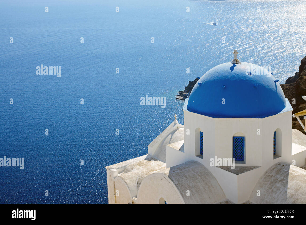 Church with blue cupola in Oia Stock Photo