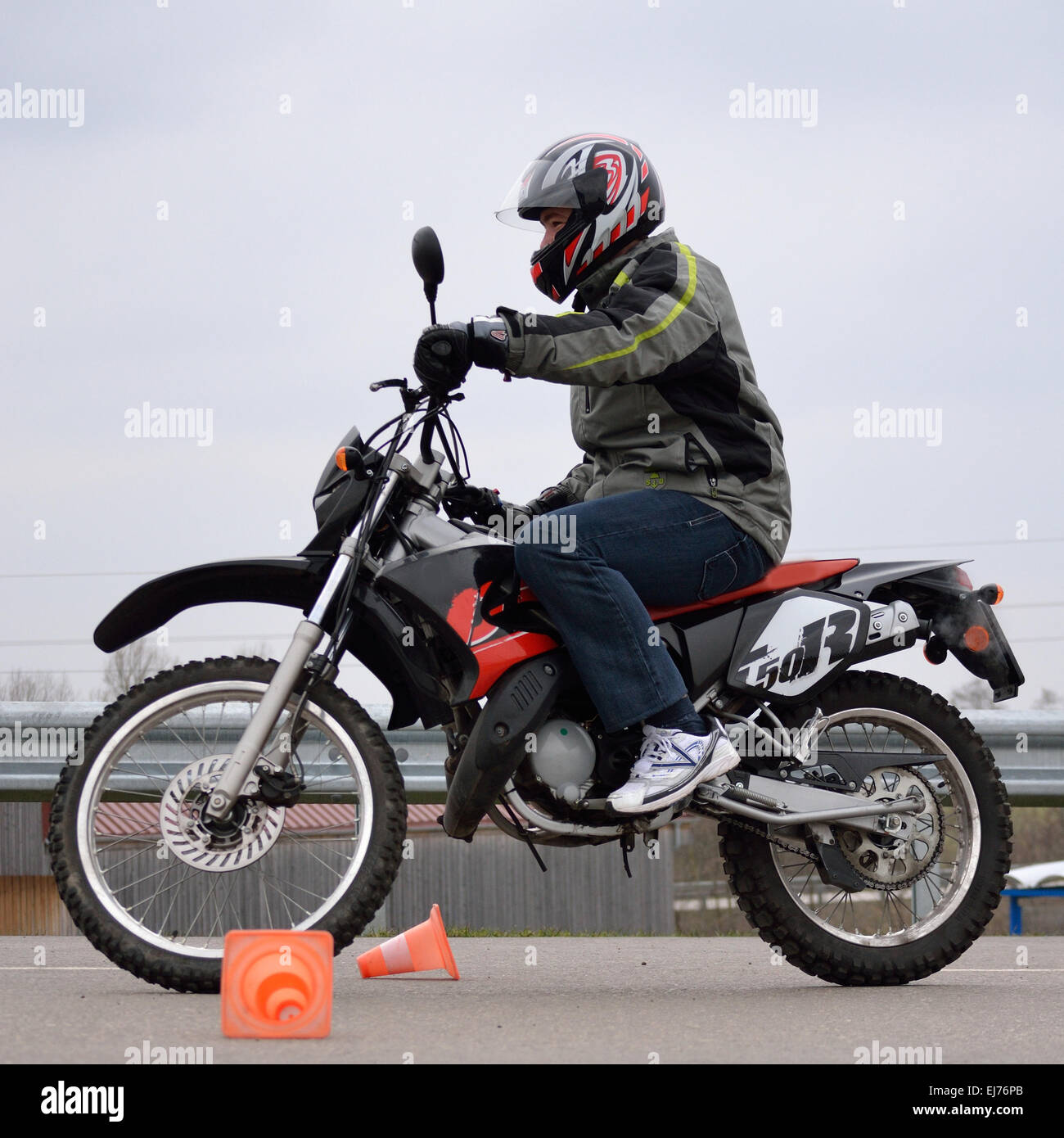 teenager driving autocycle Stock Photo