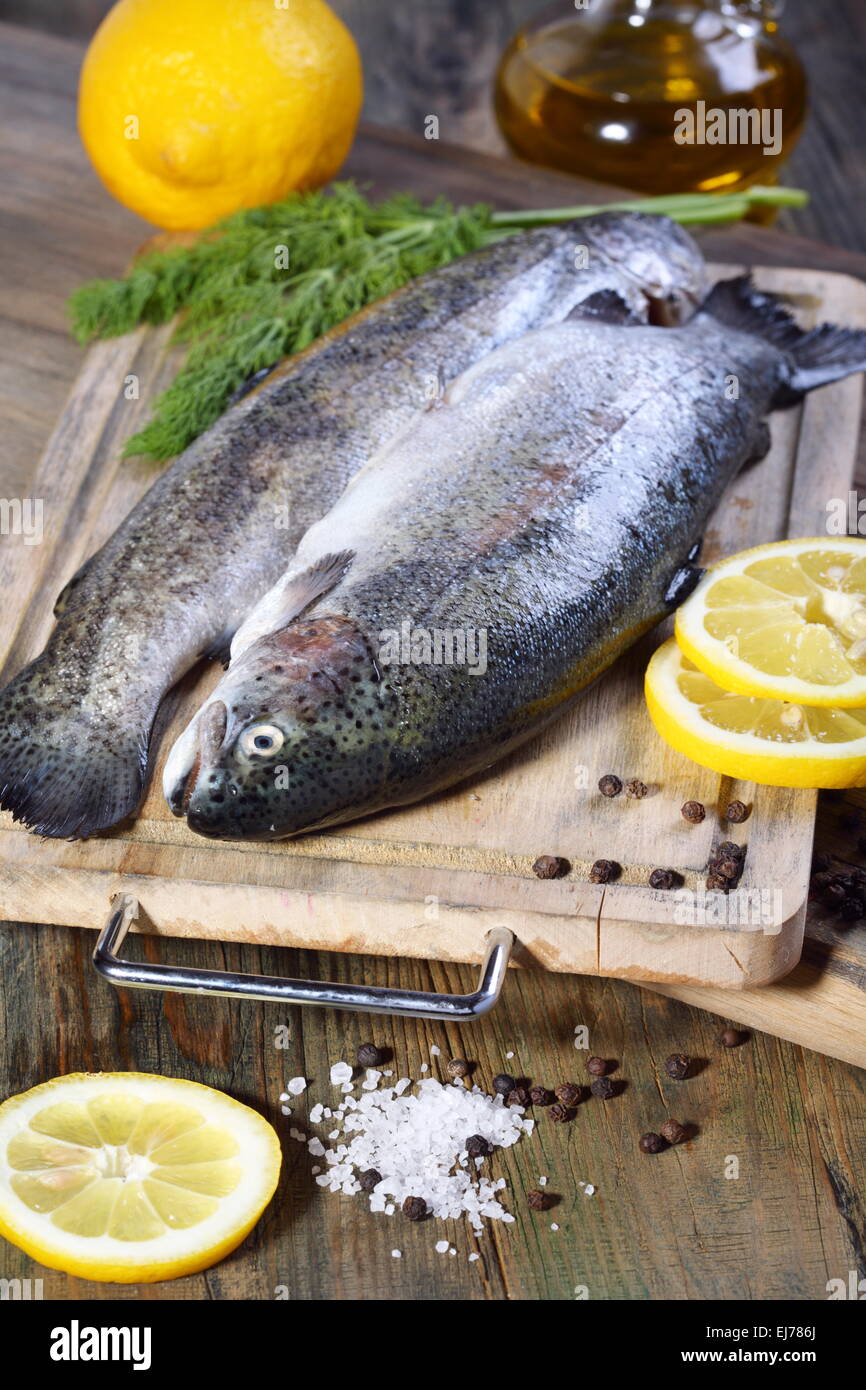 Trout on a cutting board Stock Photo Alamy