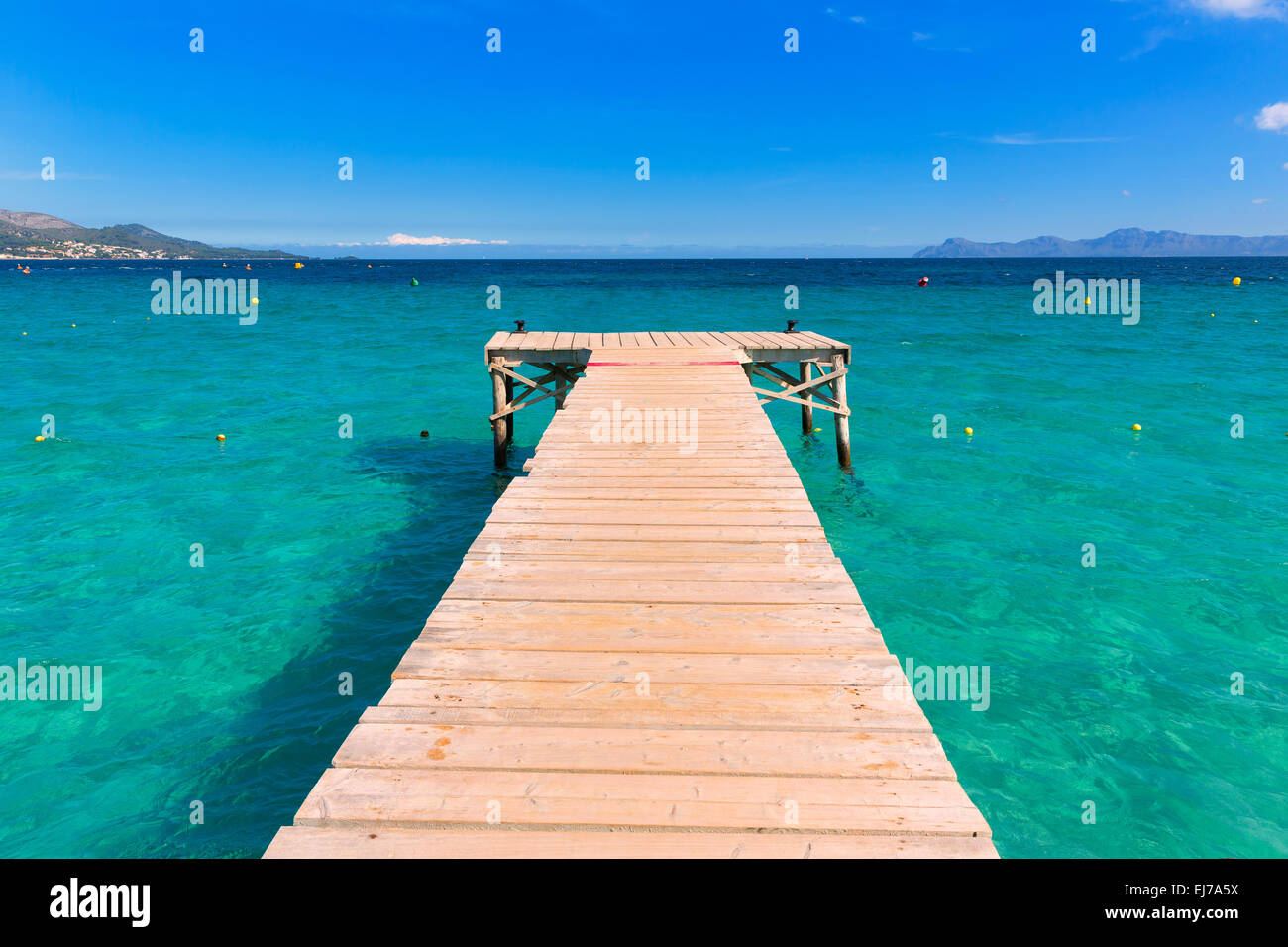 Majorca Platja de Muro beach pier in Alcudia bay in Mallorca Balearic islands of Spain Stock Photo