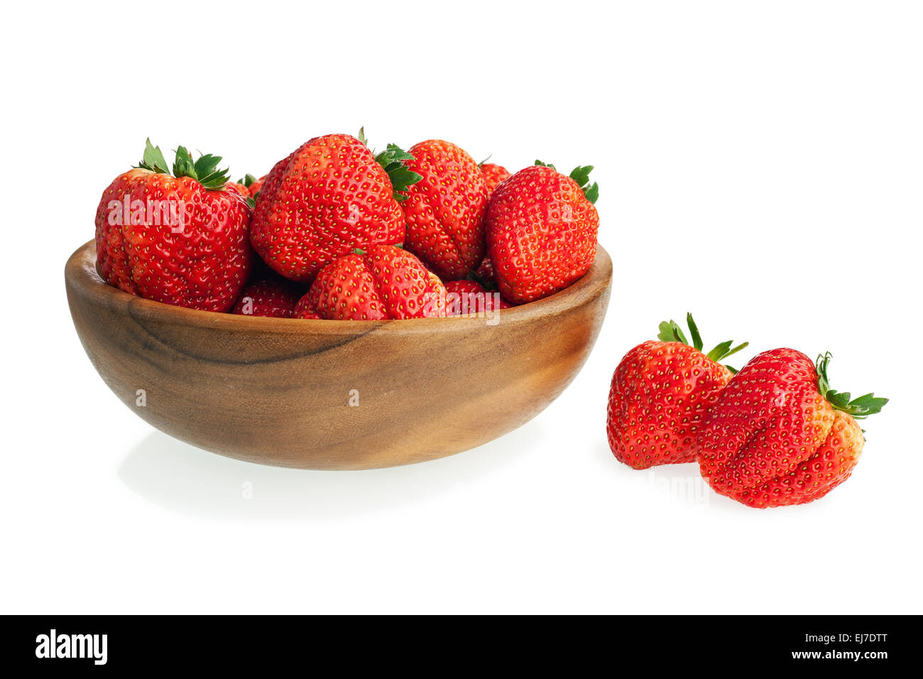 Fresh ripe strawberries in wooden bowl isolated on white background ...