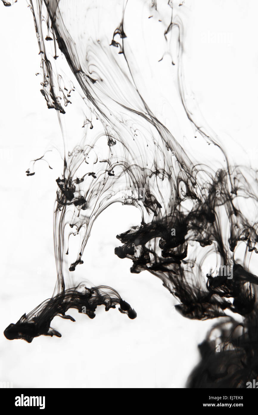 Black ink in the water Stock Photo