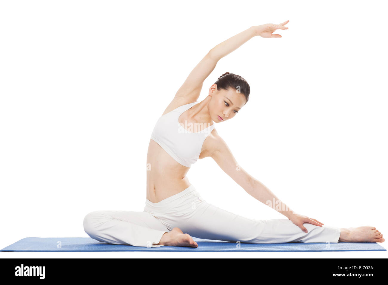 The young woman is doing yoga Stock Photo - Alamy
