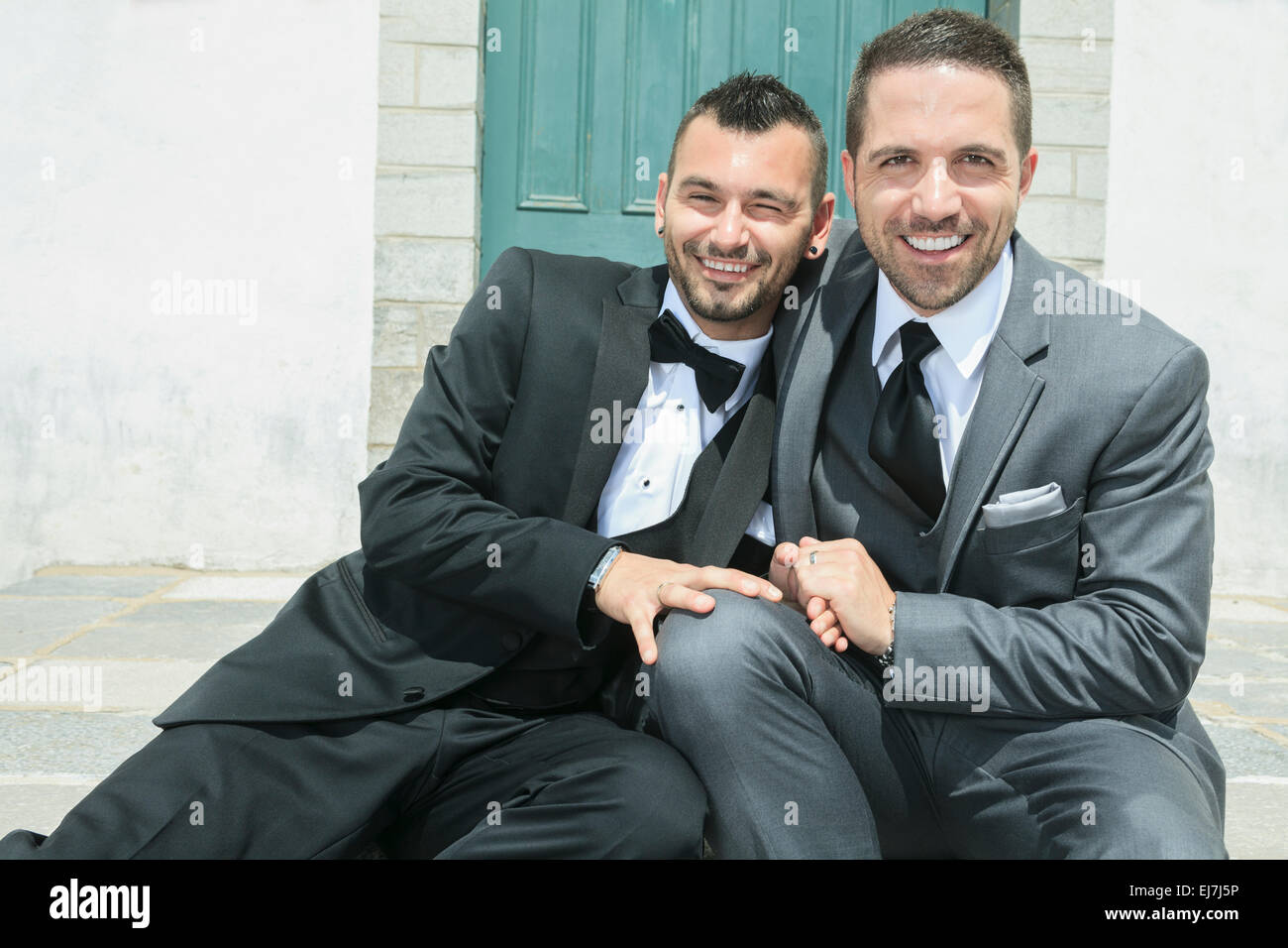 Portrait of a loving gay male couple on their wedding day. Stock Photo