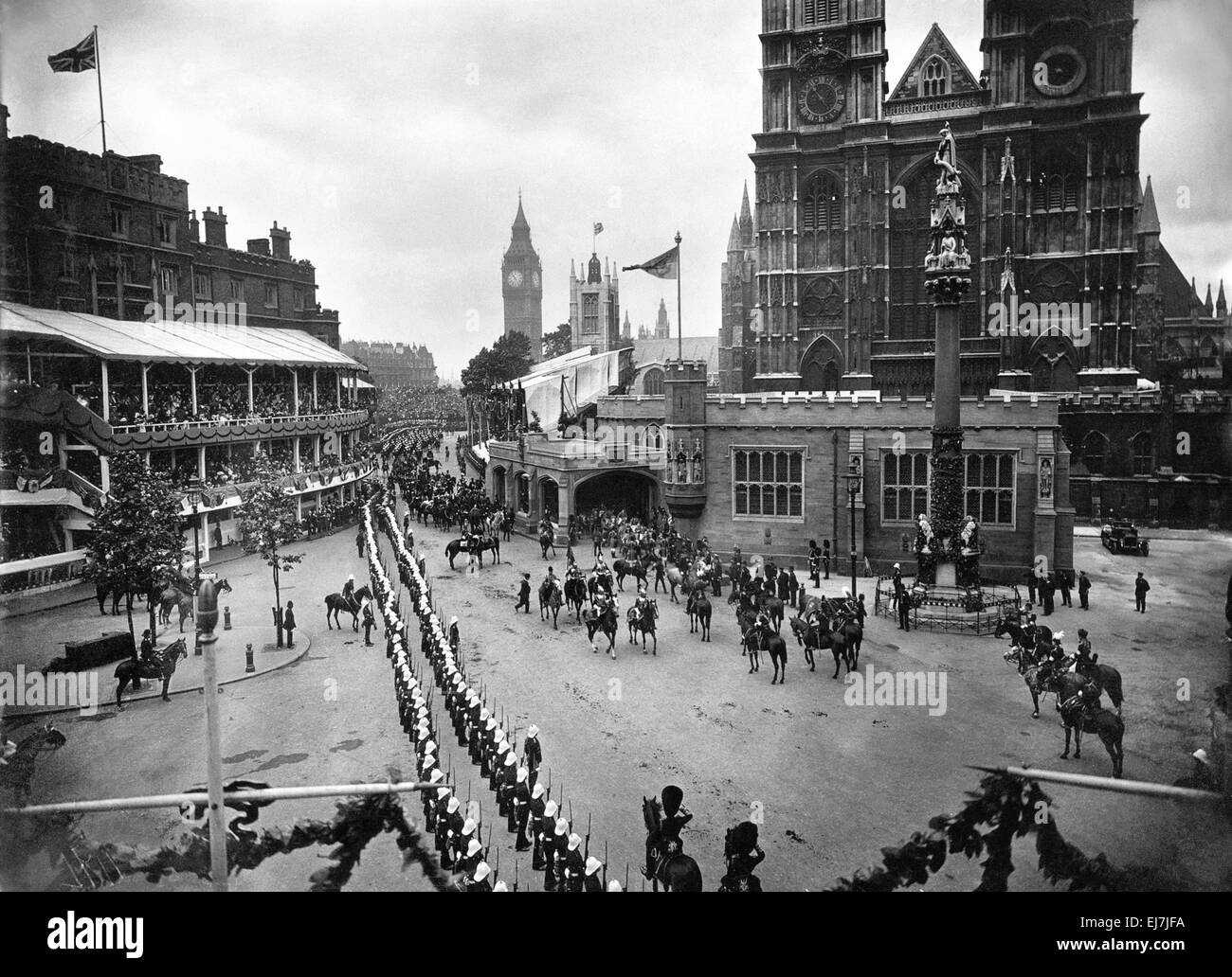Coronation of King George VI. Aerial view of the procession in progress marching down Victoria Street toward Westminster Abbey.  12th May 1937. Stock Photo