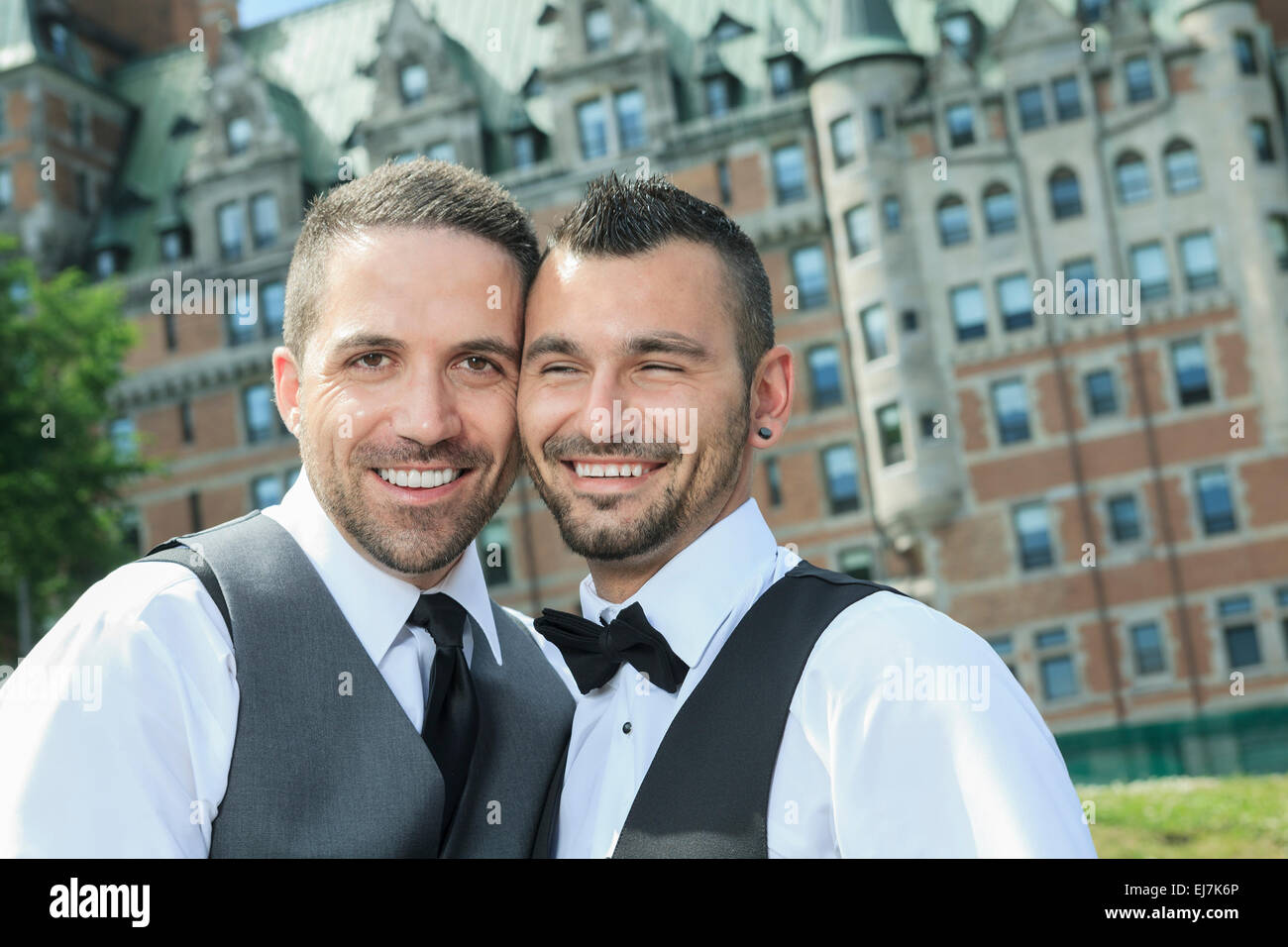 Portrait of a loving gay male couple on their wedding day. Stock Photo