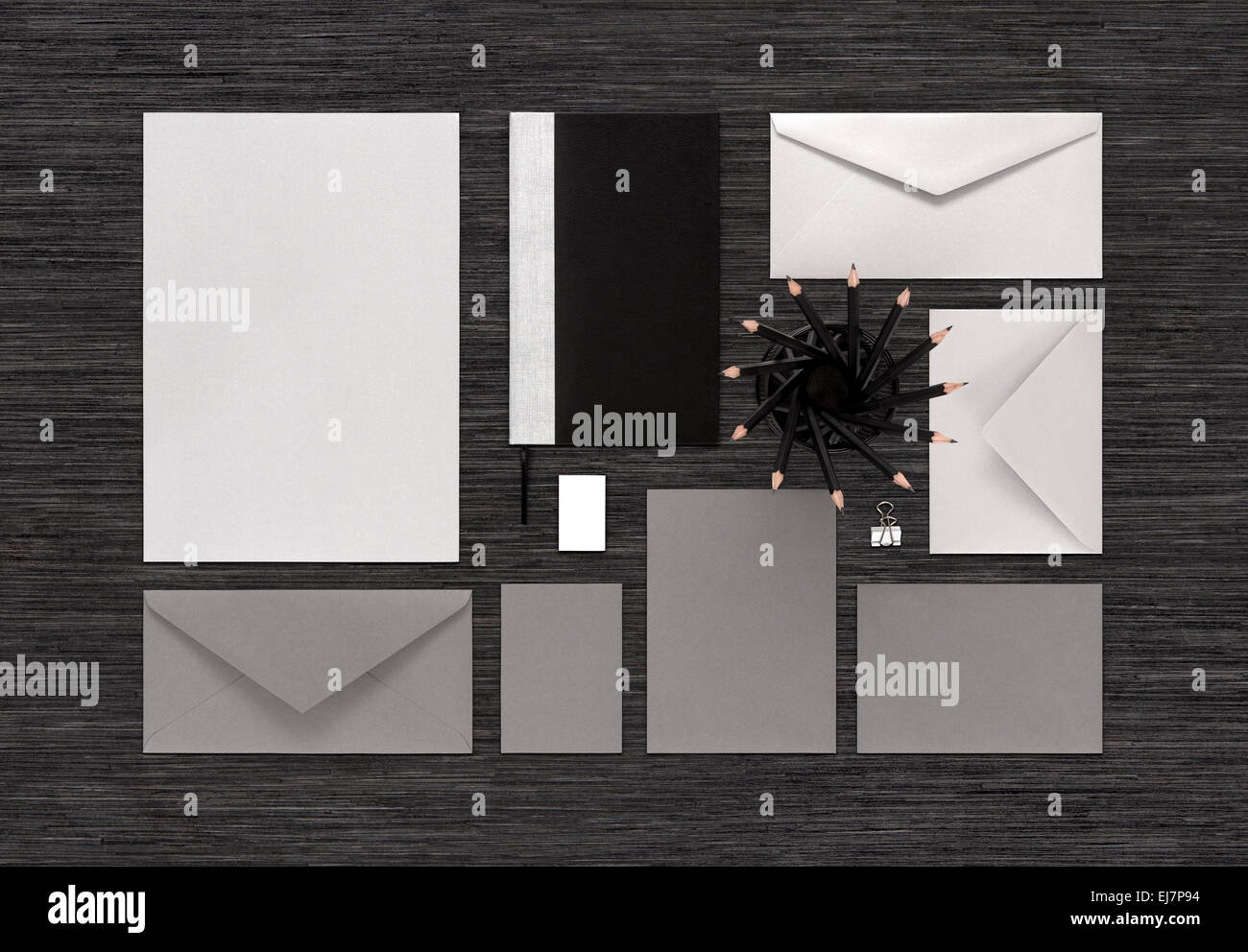 Top view of template for corporate branding identity for design presentation or portfolio on black table. Stock Photo