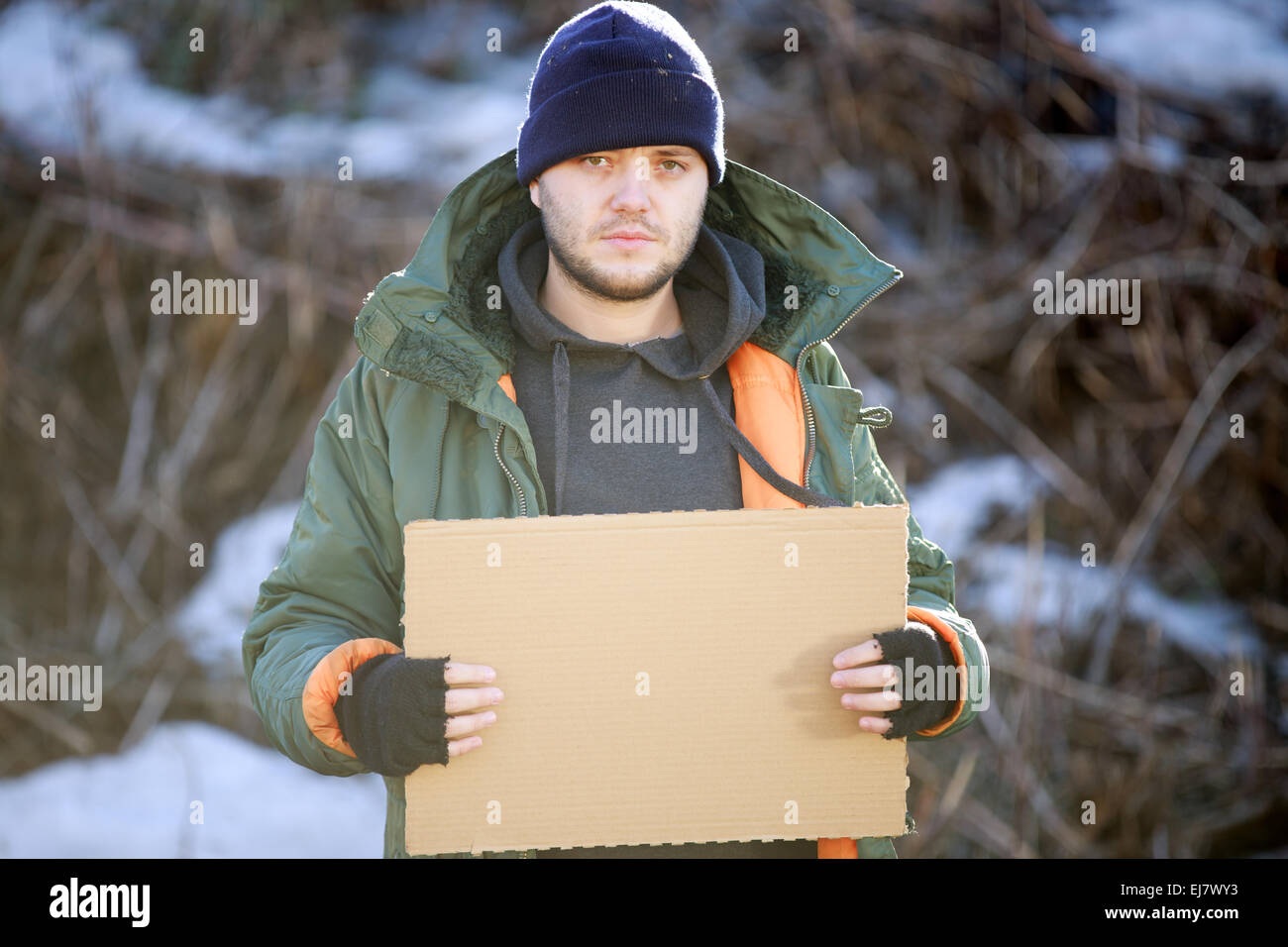 Homeless Man Holds Blank Cardboard For Your Text Stock Photo Alamy Homeless Man Holds Blank Cardboard For Your Text Stock Photo Alamy