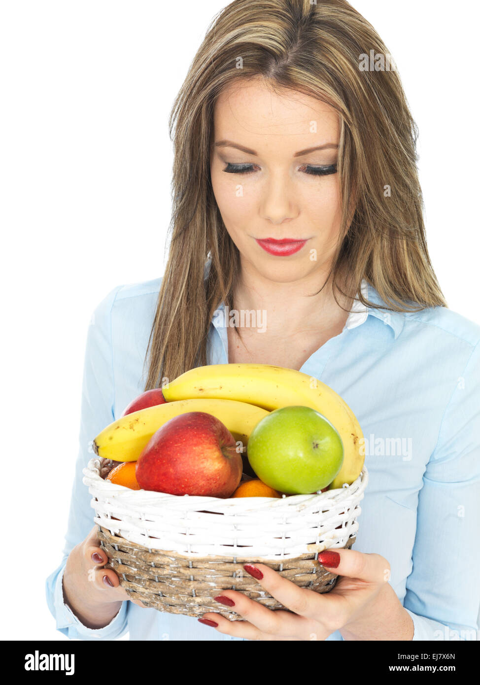 Woman holding fruit basket hi-res stock photography and images - Alamy