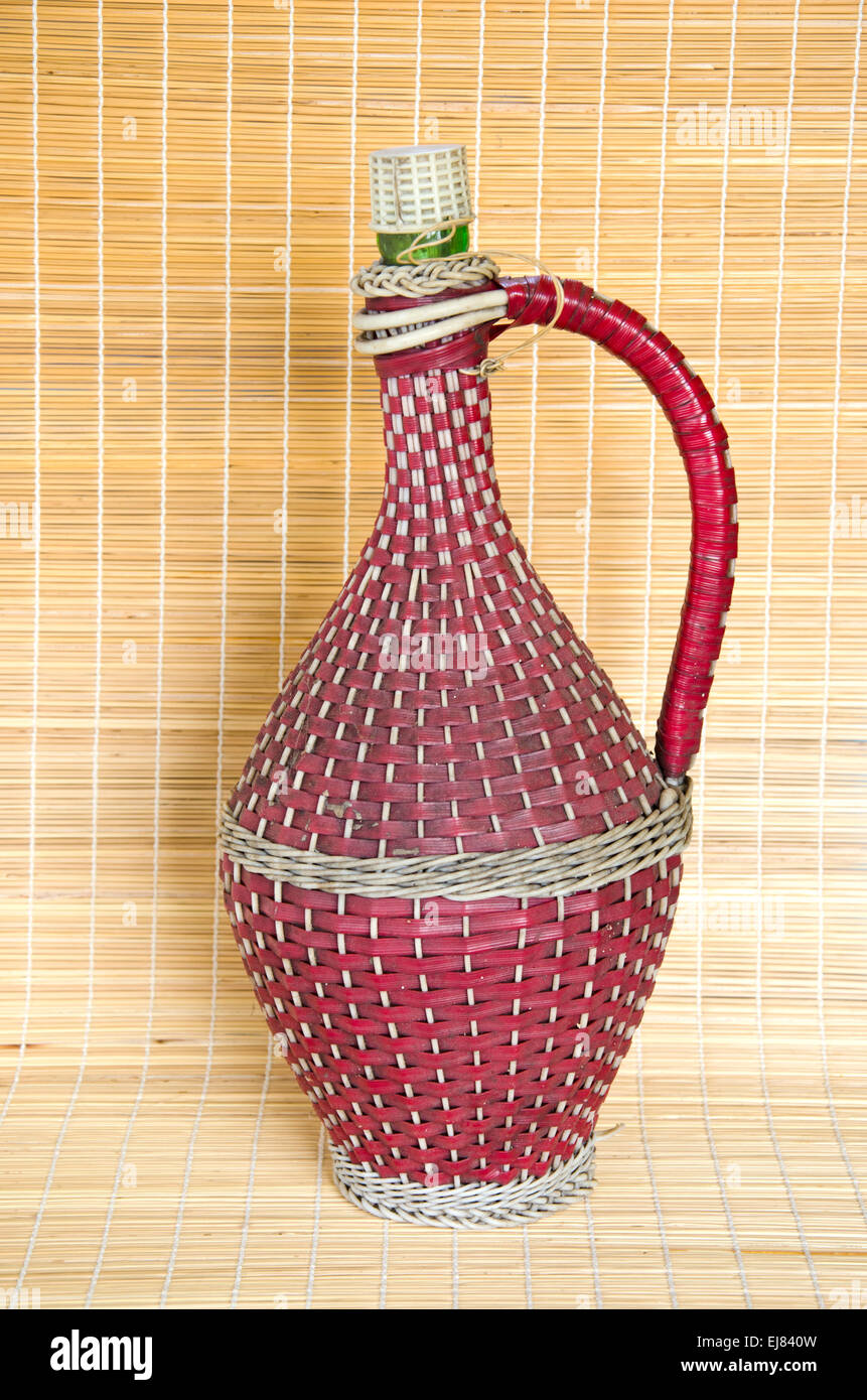 Vintage wicker braided wine bottle hi-res stock photography and images ...