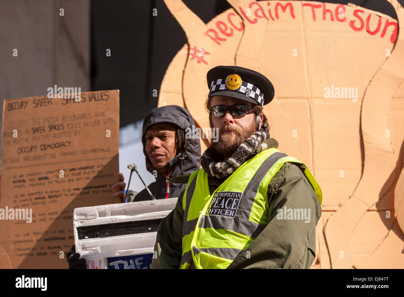 London Bridge Station, London, UK.  23rd March, 2015. Demonstrators gather with their placards outside News UK's headquarters, 'the Little Shard' near London Bridge as part of the Occupy Rupert Murdoch protest.  The protest is against the dominance of billionaire owners of UK media: Rupert Murdoch (News UK), Viscount Rothermere (Daily Mail Group), Richard Desmond (The Express) and the Barclay brothers (Telegraph). Credit:  Stephen Chung/Alamy Live News Stock Photo