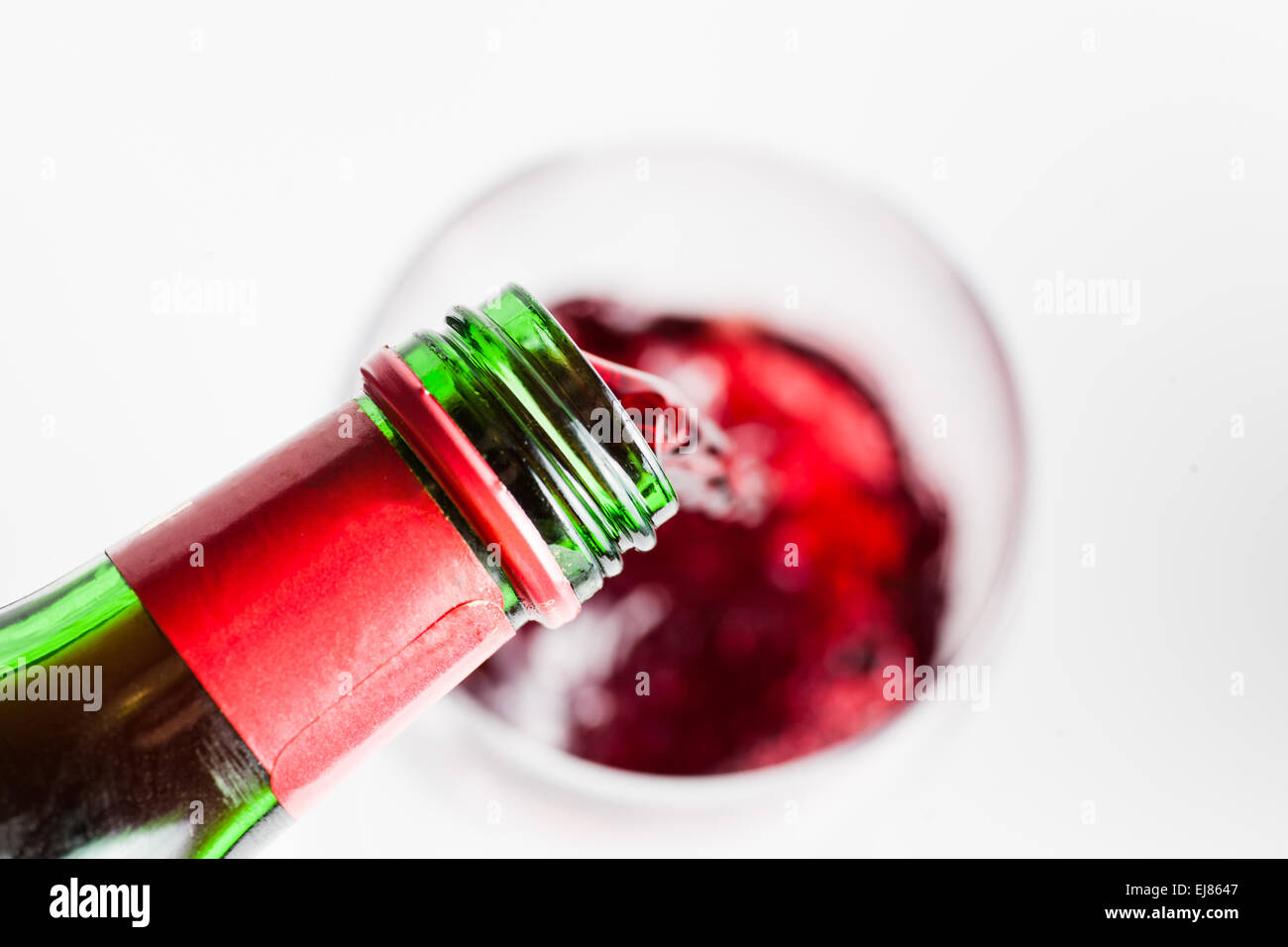 Red vine pouring into glass Stock Photo Alamy