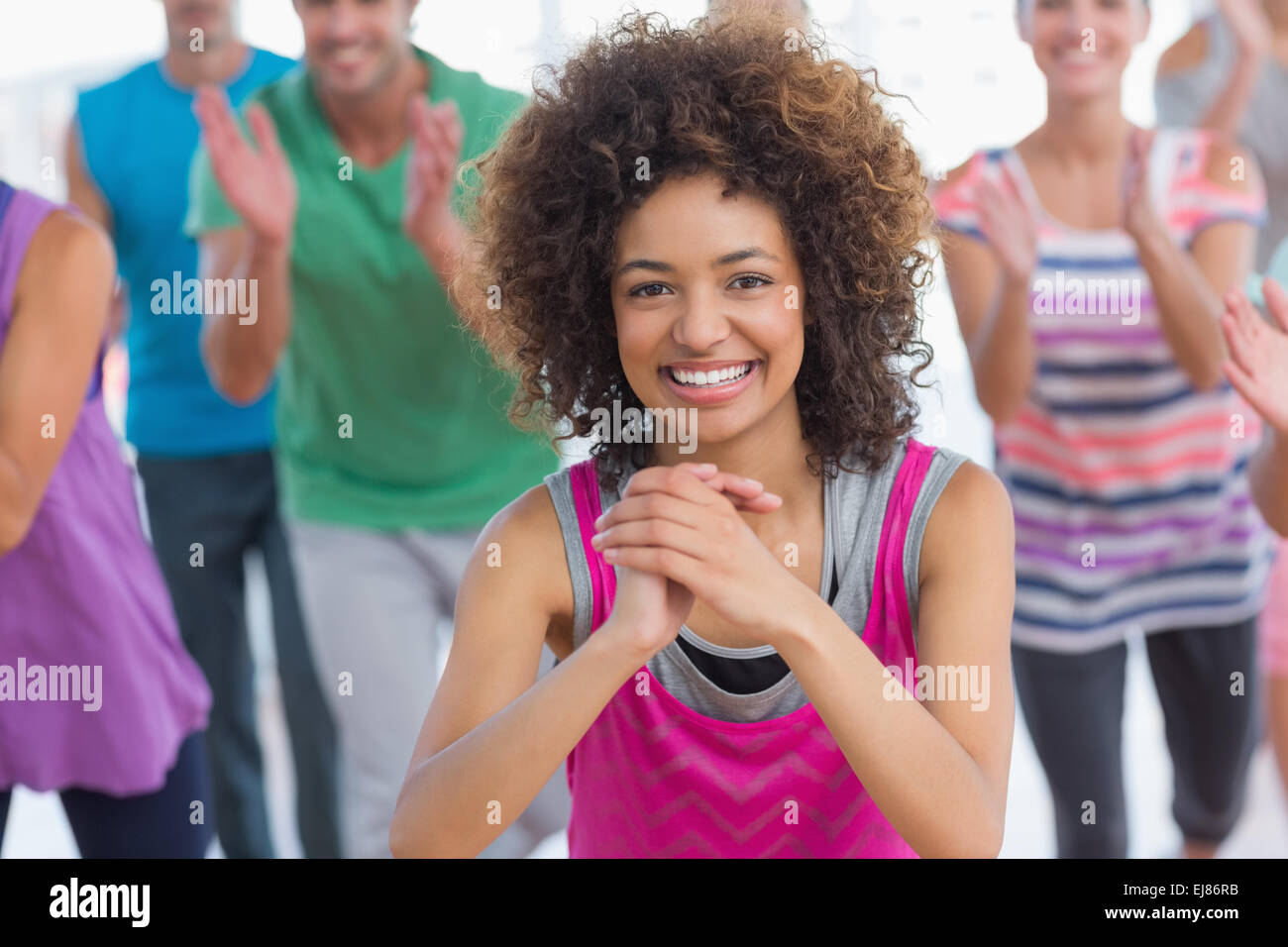 Fitness class and instructor doing pilates exercise Stock Photo - Alamy