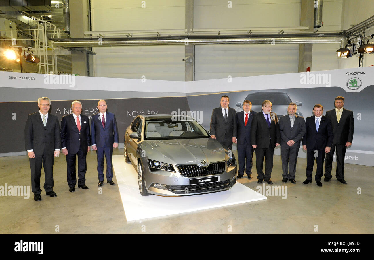 From left Member of the Board of Management for Production Michael Oeljeklaus, Skoda Auto CEO Winfried Vahland, Czech Prime Minister Bohuslav Sobotka, Minister of Industry and Trade of Czech Republic Jan Mladek and Governor of Hradec Kralove Region Lubomir Franc pose for photo next to third generation of Skoda Superb in Kvasiny plant, East Bohemia, Czech Republic, March 23, 2015. Bohuslav Sobotka and representatives of the Hradec Kralove Region and Skoda Auto signed a cooperation memorandum on the development of the Solnice-Kvasiny industrial zone according to which the zone will get about Kc2 Stock Photo