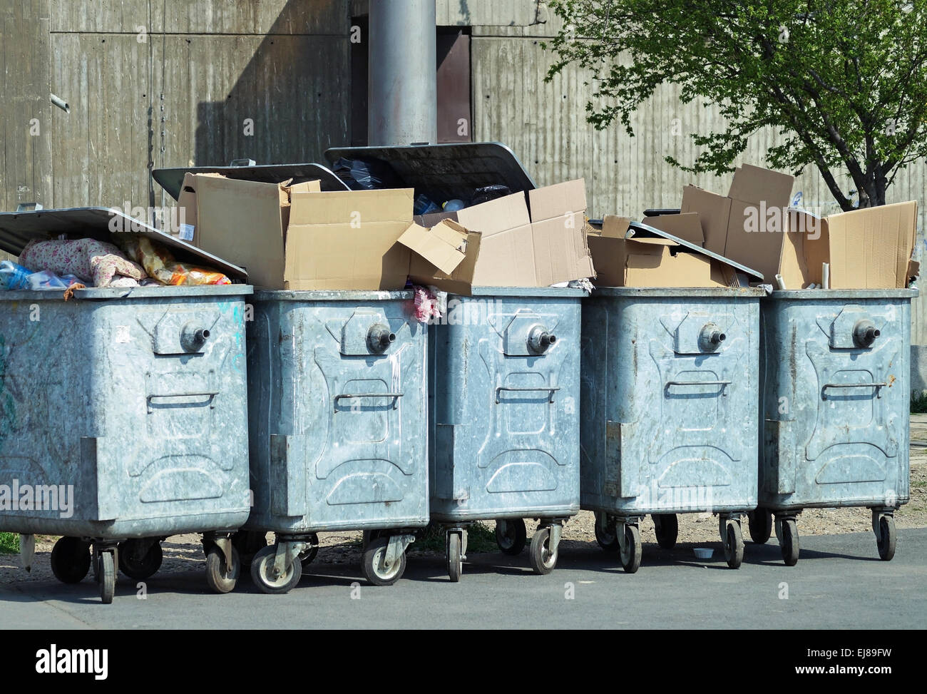 Large industrial garbage cans on the street Stock Photo Alamy