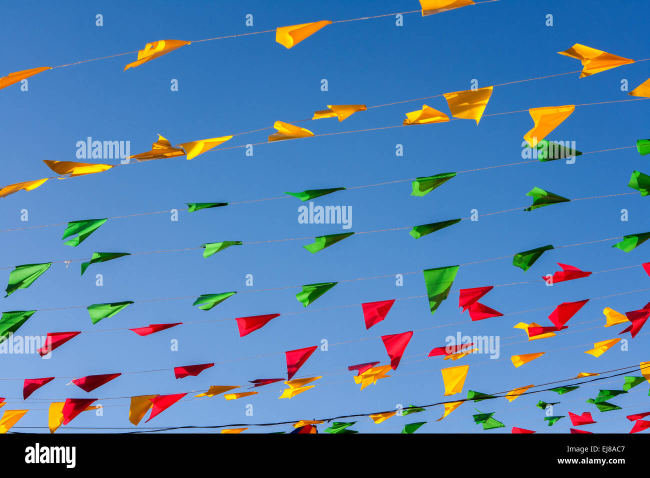 Bunting, colorful party flags, on a blue sky Stock Photo - Alamy