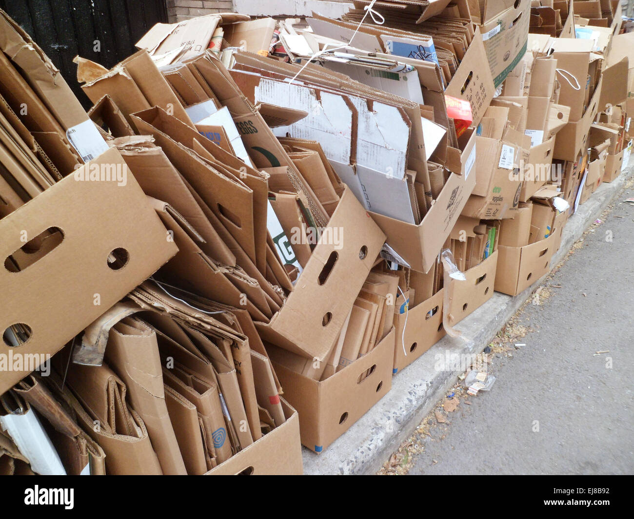 Cardboard trash bundled for pick up and recycling in New York on Friday,  February 20. 2015. (© Richard B. Levine Stock Photo - Alamy