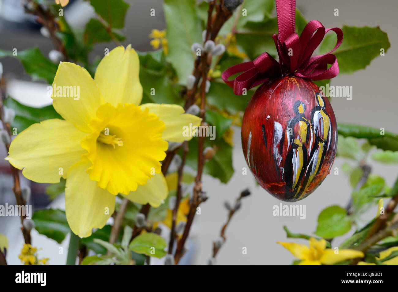 Daffodil and painted Easter egg Stock Photo