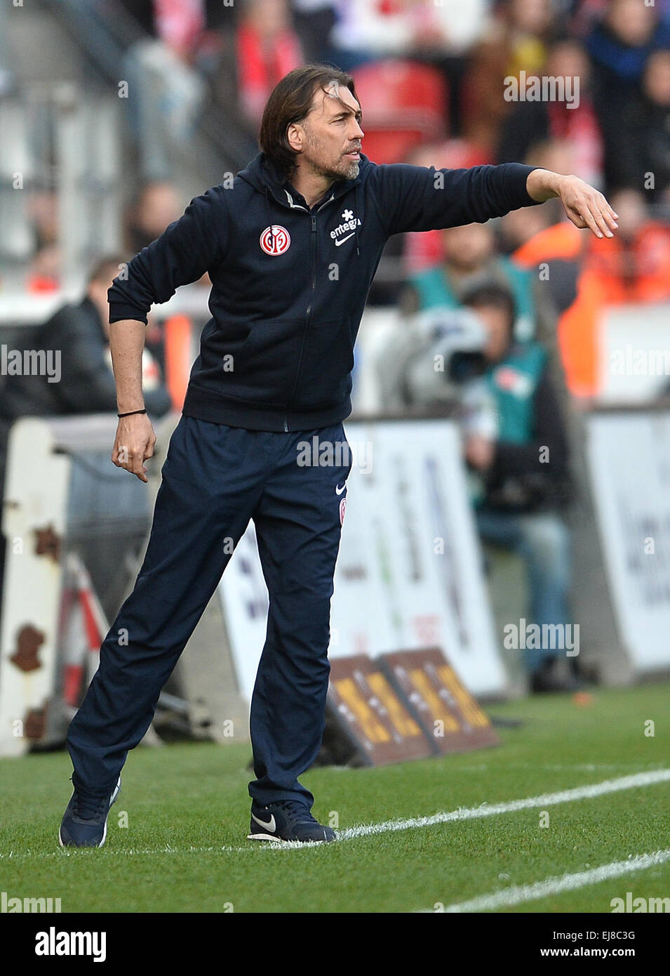 Mainz, Germany. 22nd Mar, 2015. Mainz's coach Martin Schmidt gestures during the German Bundesliga soccer match between 1. FSV Mainz 05 and VfL Wolfsburg in the Coface Arena in Mainz, Germany, 22 March 2015. © dpa picture alliance/Alamy Live News Stock Photo
