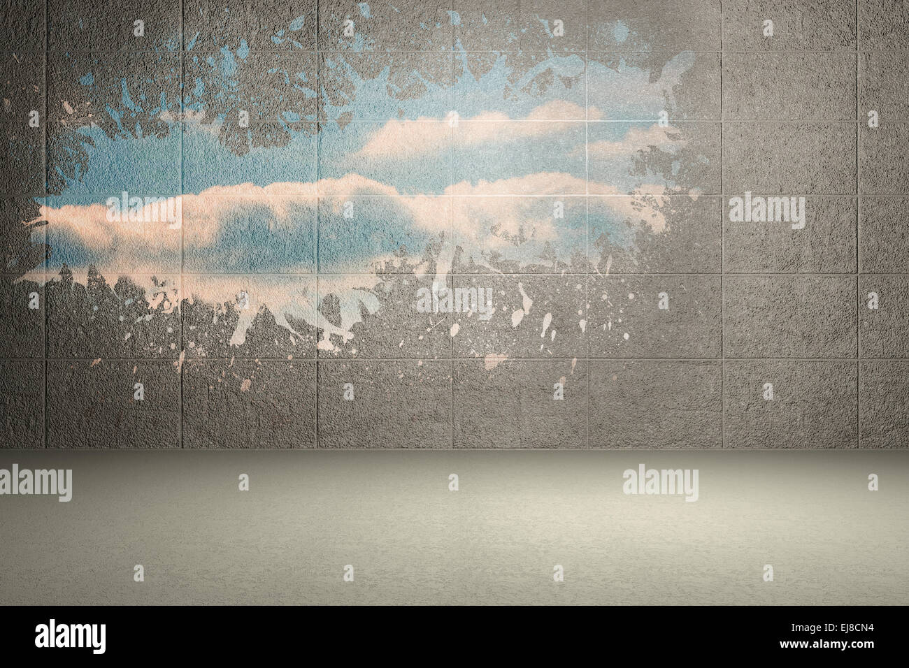 Splash on wall revealing bright sky Stock Photo